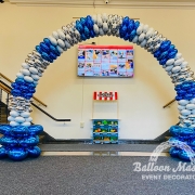 Silver blue and white balloon arch.