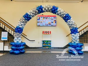 Silver blue and white balloon arch.